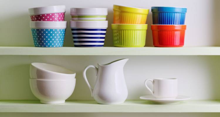 kitchen shelves with colourful bowls