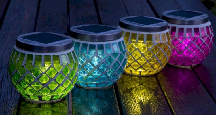 Colourful solar powered lights in glass jars
