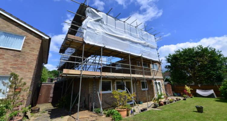 house extension with scaffolding