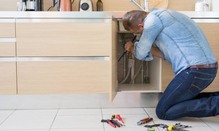 person installing kitchen