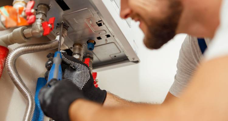 person installing boiler