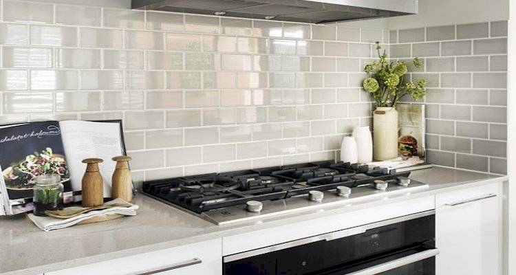 white kitchen with black hob