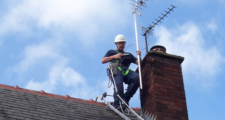 person standing on roof