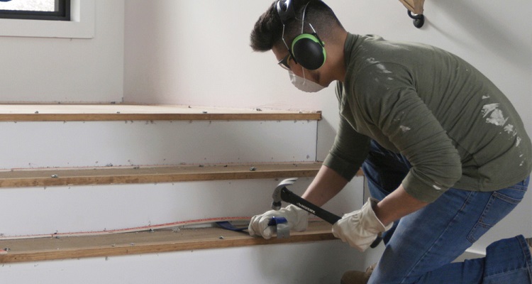 Man removing staircase