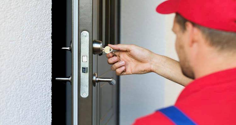 Man installing door