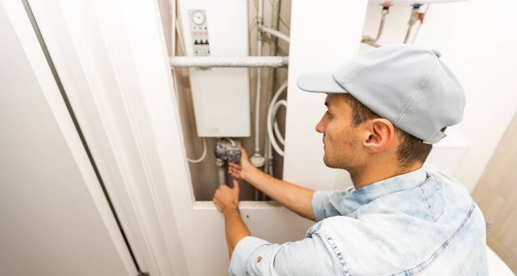 person fitting electric boiler