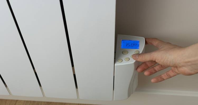 hand on heater panel