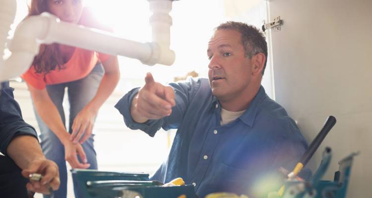 plumber talking to customer