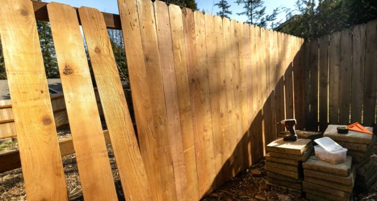 fixing wooden fence