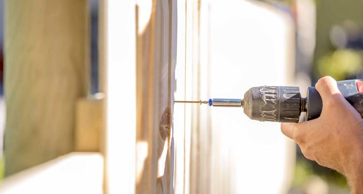 Drilling a wood fence