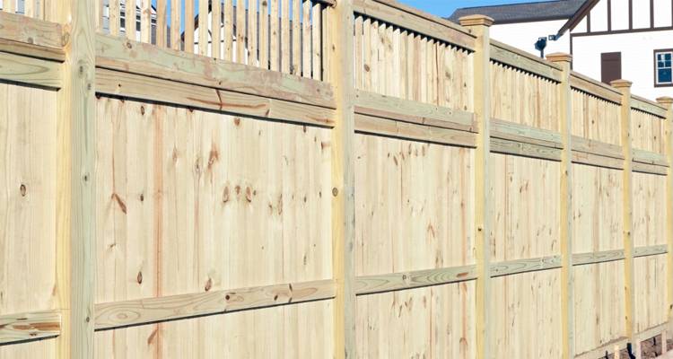 Light coloured wood fence panels