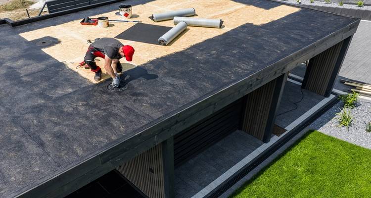 man laying roof