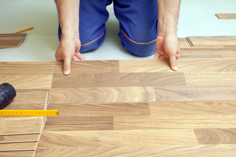 person installing laminate
