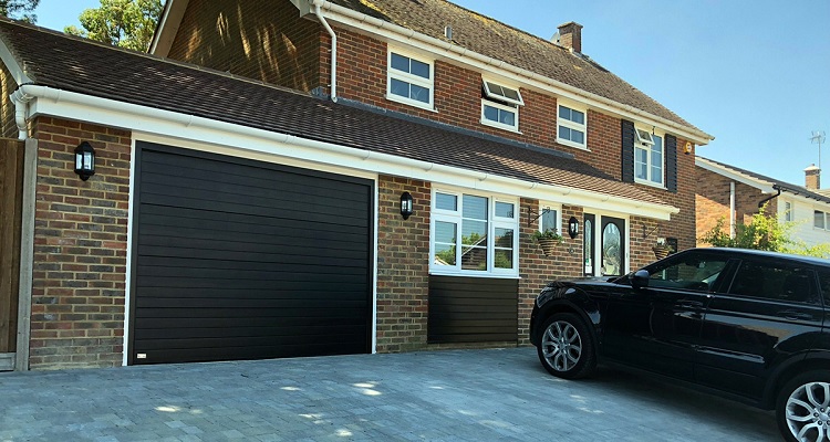 garage with black door