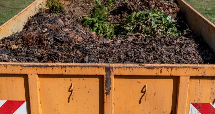 skip full of garden waste