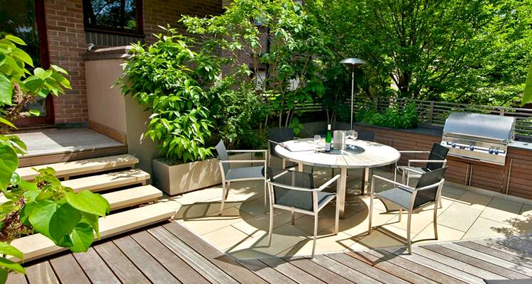 Table and chairs on garden decking