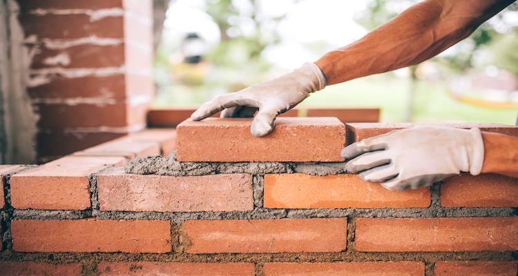 laying bricks