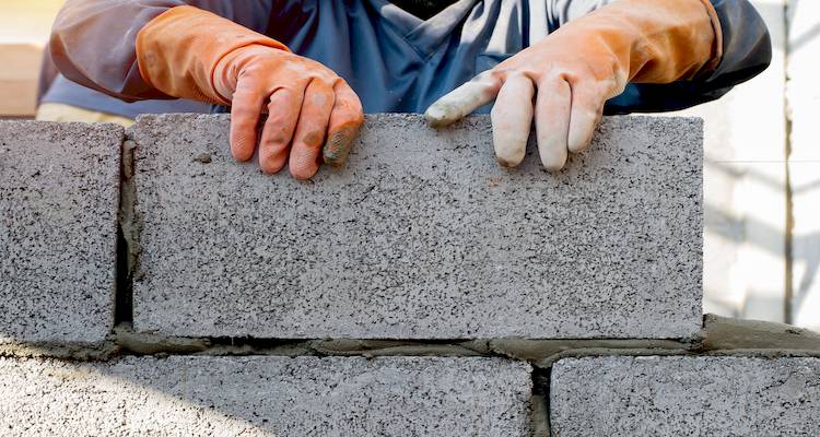 laying bricks