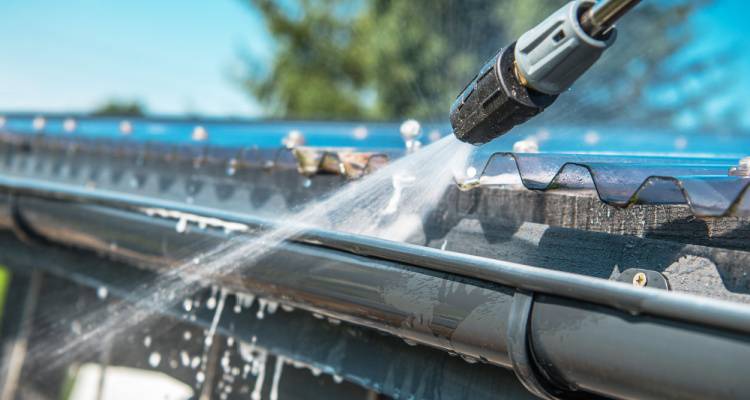 jet washing a gutter