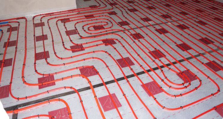 house extension cost guide — underfloor heating pipes before the flooring is installed