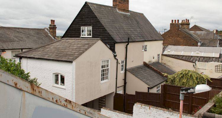 house extension cost guide — UK property with a large side extension