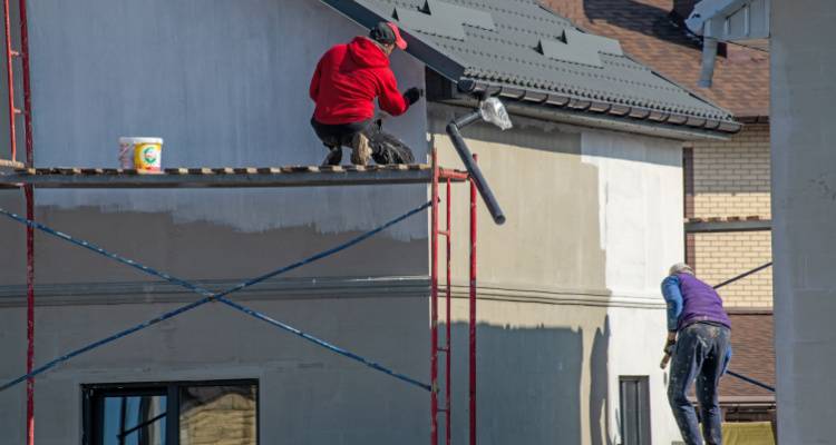 people painting house