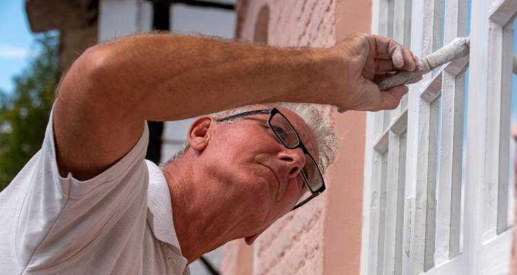 people painting house