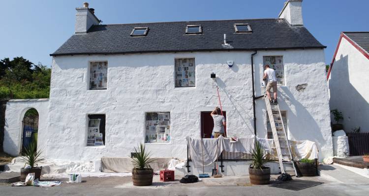 people painting house
