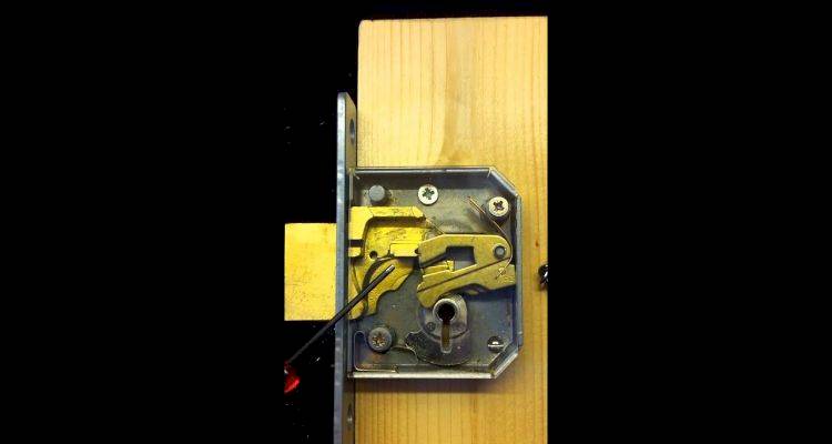 locksmith cost guide — closeup of a 5 lever mortice deadlock locking system