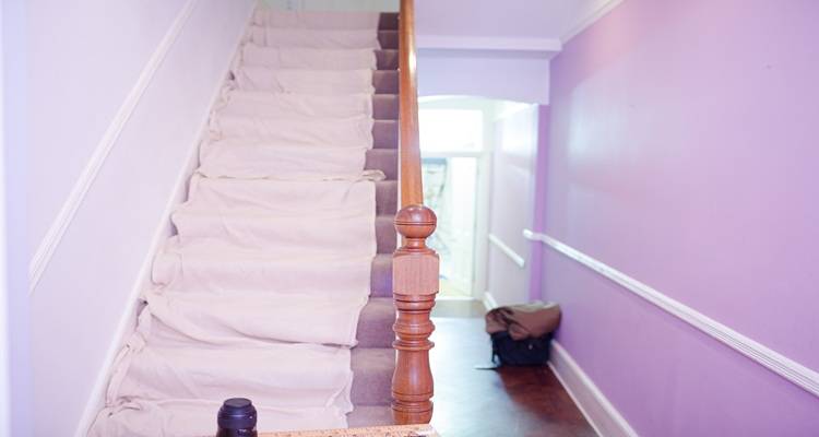 pink hallway dust sheets