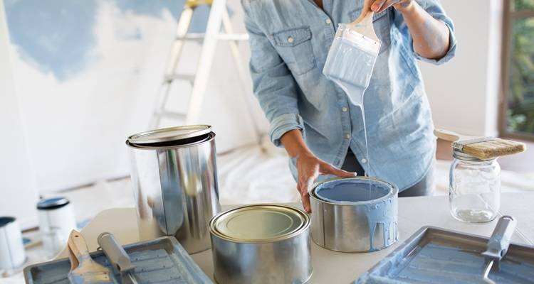 person blue paint room