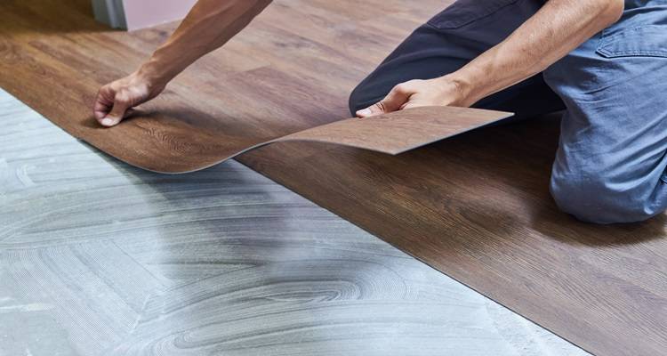 Vinyl flooring being laid