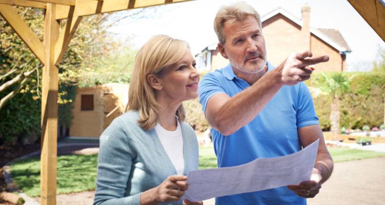 gardener talking to woman