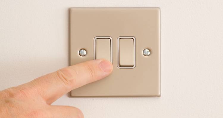 finger on lightswitch