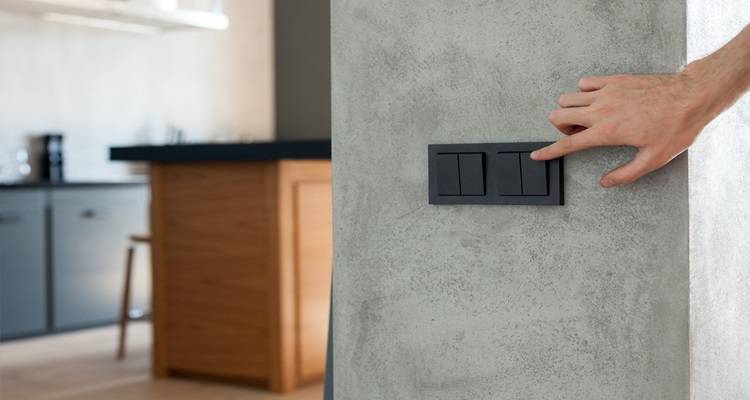 hand on lightswitch