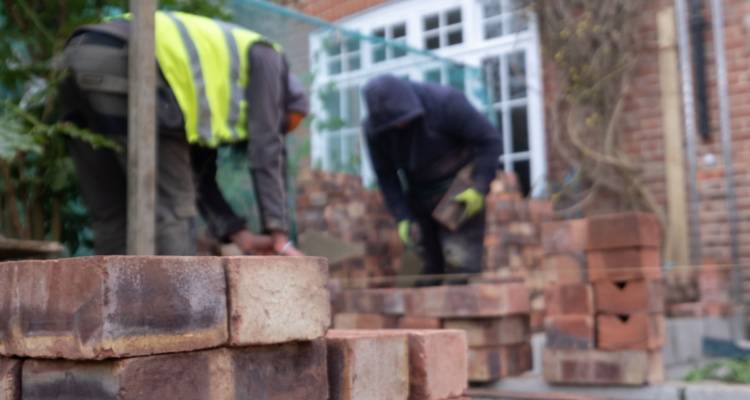 laying bricks