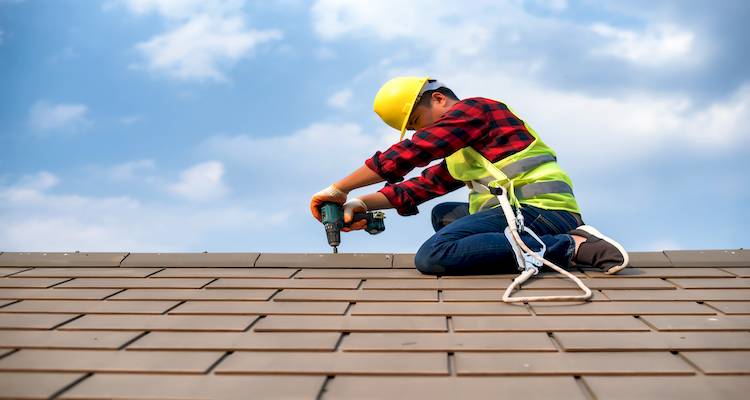 tradesperson installing a roof valley