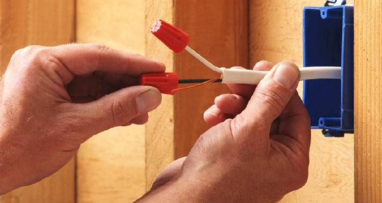 closeup of light switch fixture wiring