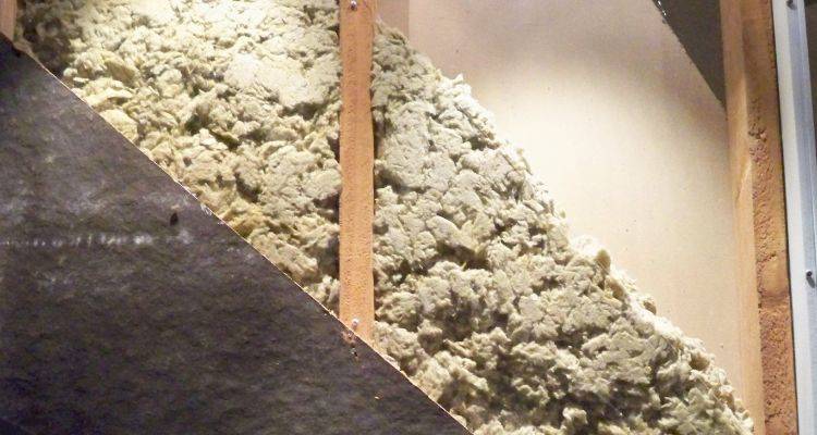 roof insulation cost guide — closeup of insulation in a roof