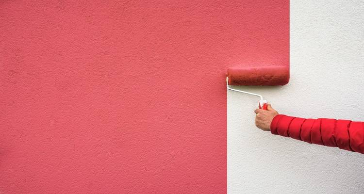 red wall being painted