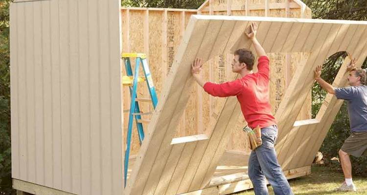 Men building a shed