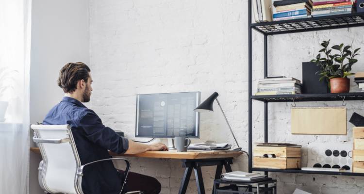 man working in home office