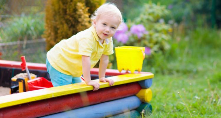 child in sandbox