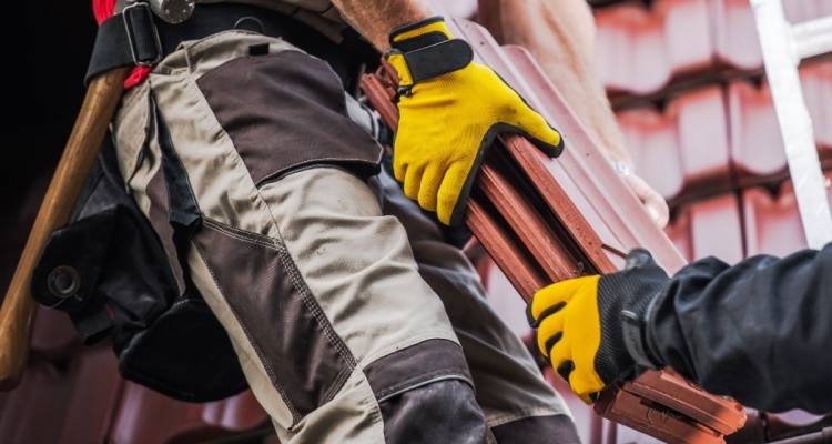 roofer with roof tiles