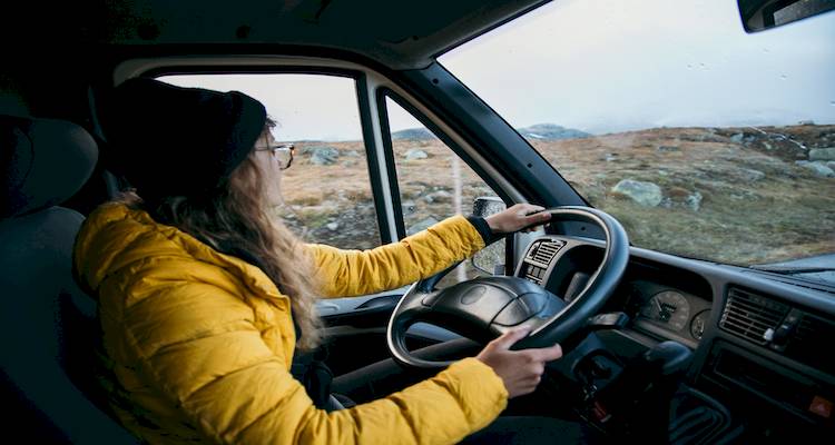 woman driving a van image