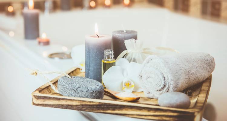 bath surrounded by candles