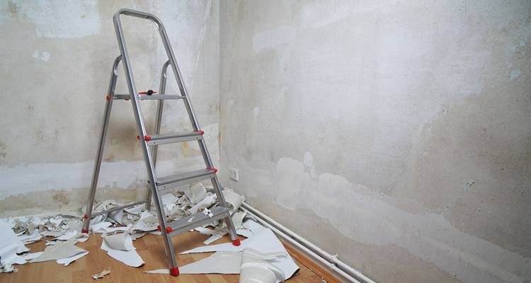 step ladder in stripped room