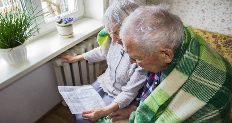 older couple with letter