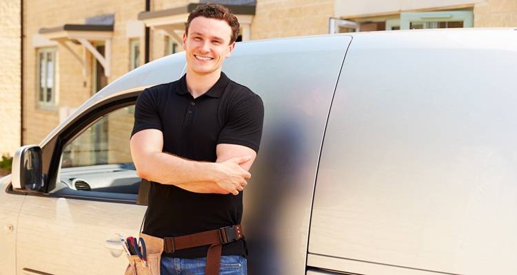 man in front of van