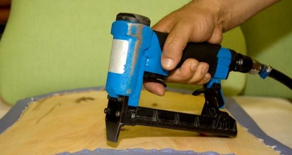 nail gun on chair base